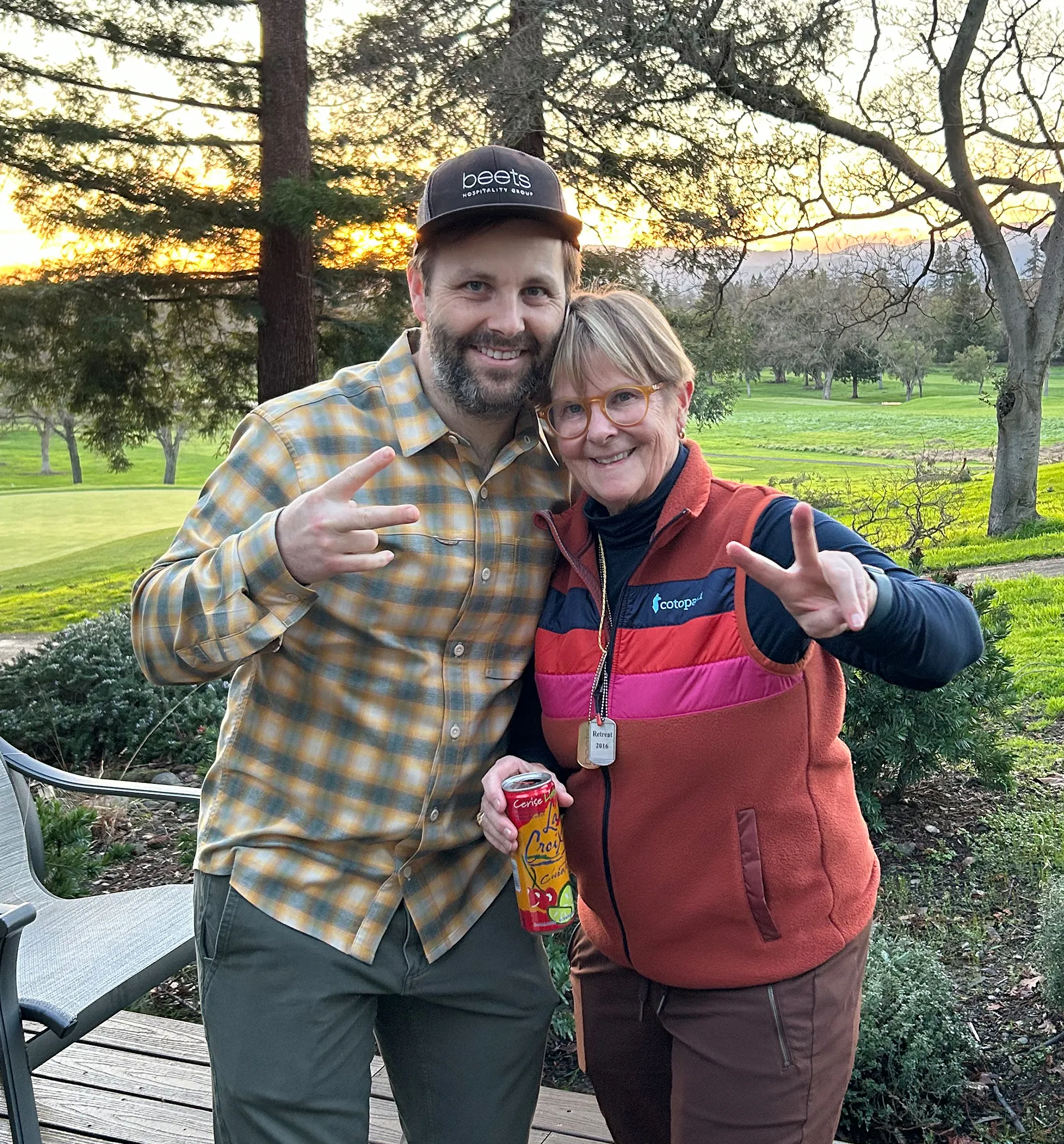 George & Read Phillips (founders) making peace signs