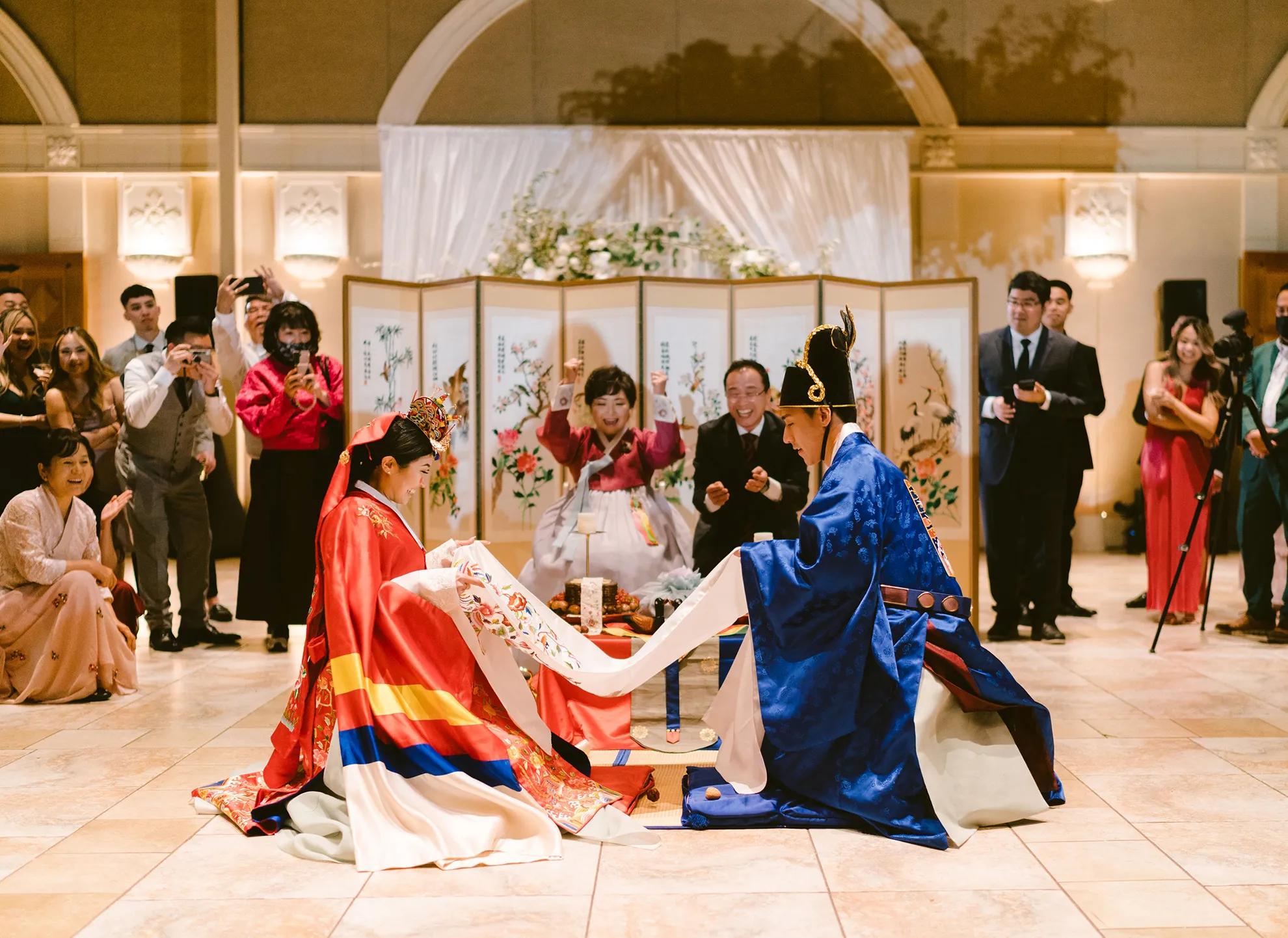 Korean Pyebaek ceremony with the couple in traditional hanbok attire